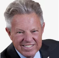 Dr. John West, practicing endodontist and founder of the Center for Endodontics, known for his innovative techniques and clinical leadership.